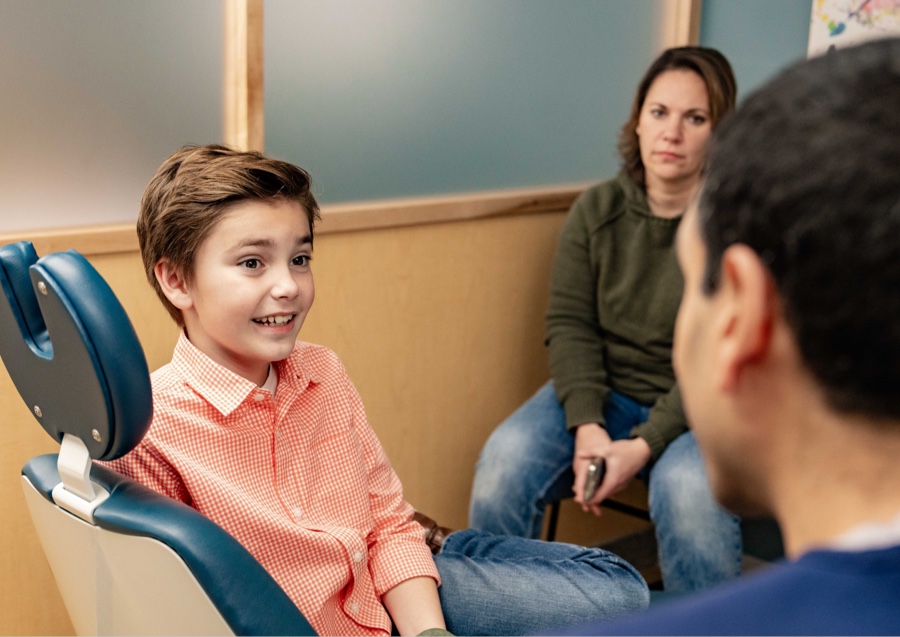 teen getting braces and smiling